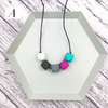 Option A in Pink, Turquoise, Black, Grey and White