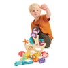 Boy playing with the wooden under the sea balancing toy