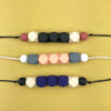 Selection of Modern Teething Necklaces for Mum and Baby