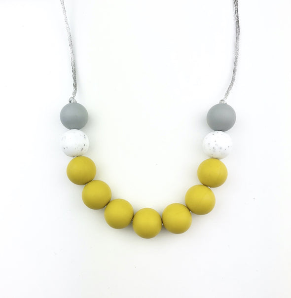Silicone Teething Necklace is Mustard, Grey and Gritty White